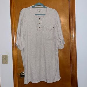 Beige knit shirt with front buttons and pocket